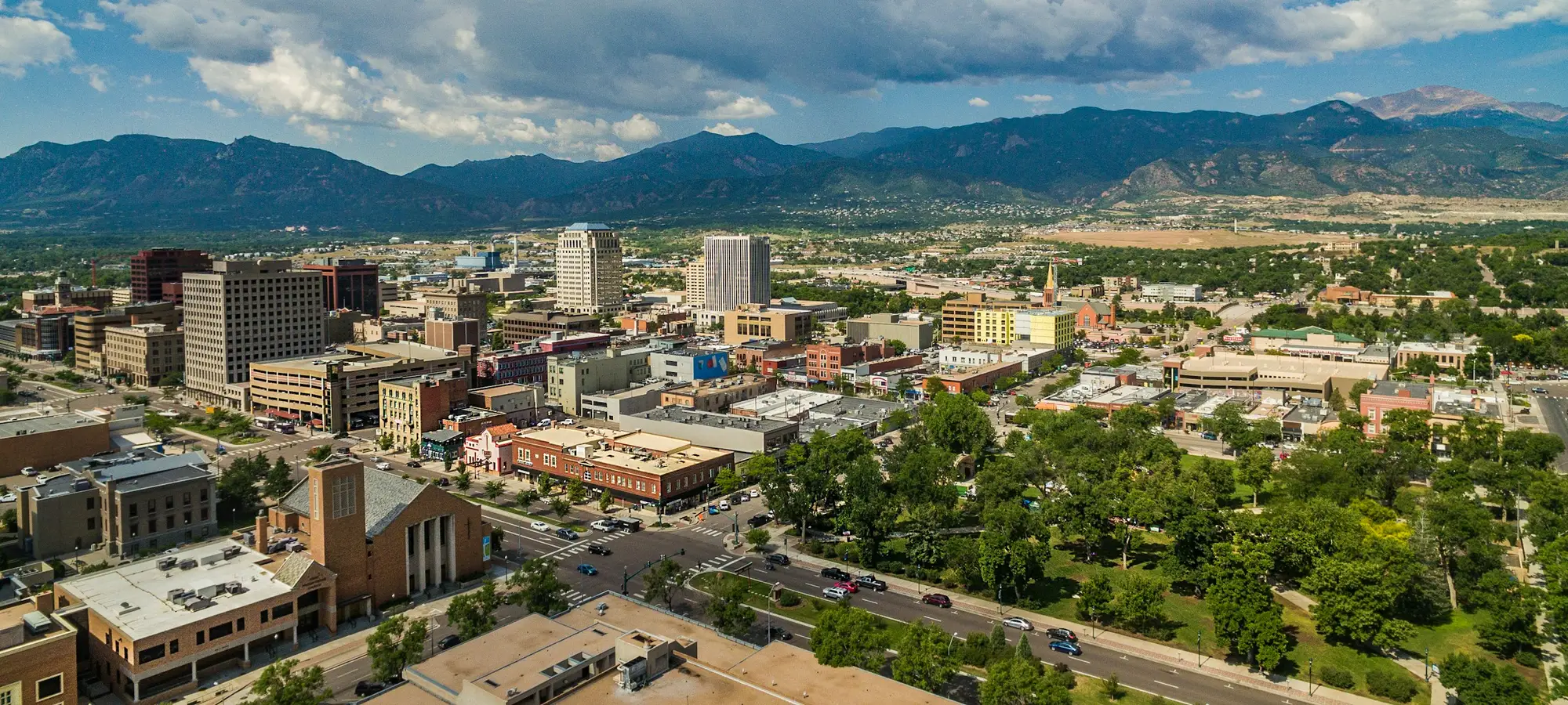 Downtown Colorado Springs with the Front Range behind
