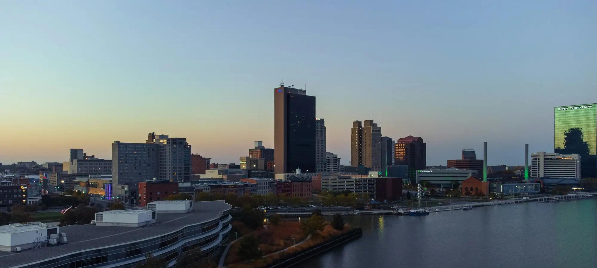 Toledo skyline along the Maumee River at dusk