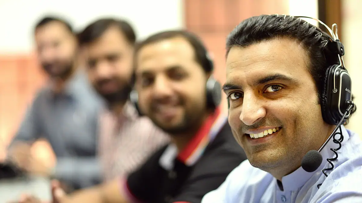 Customer service agents wearing headsets